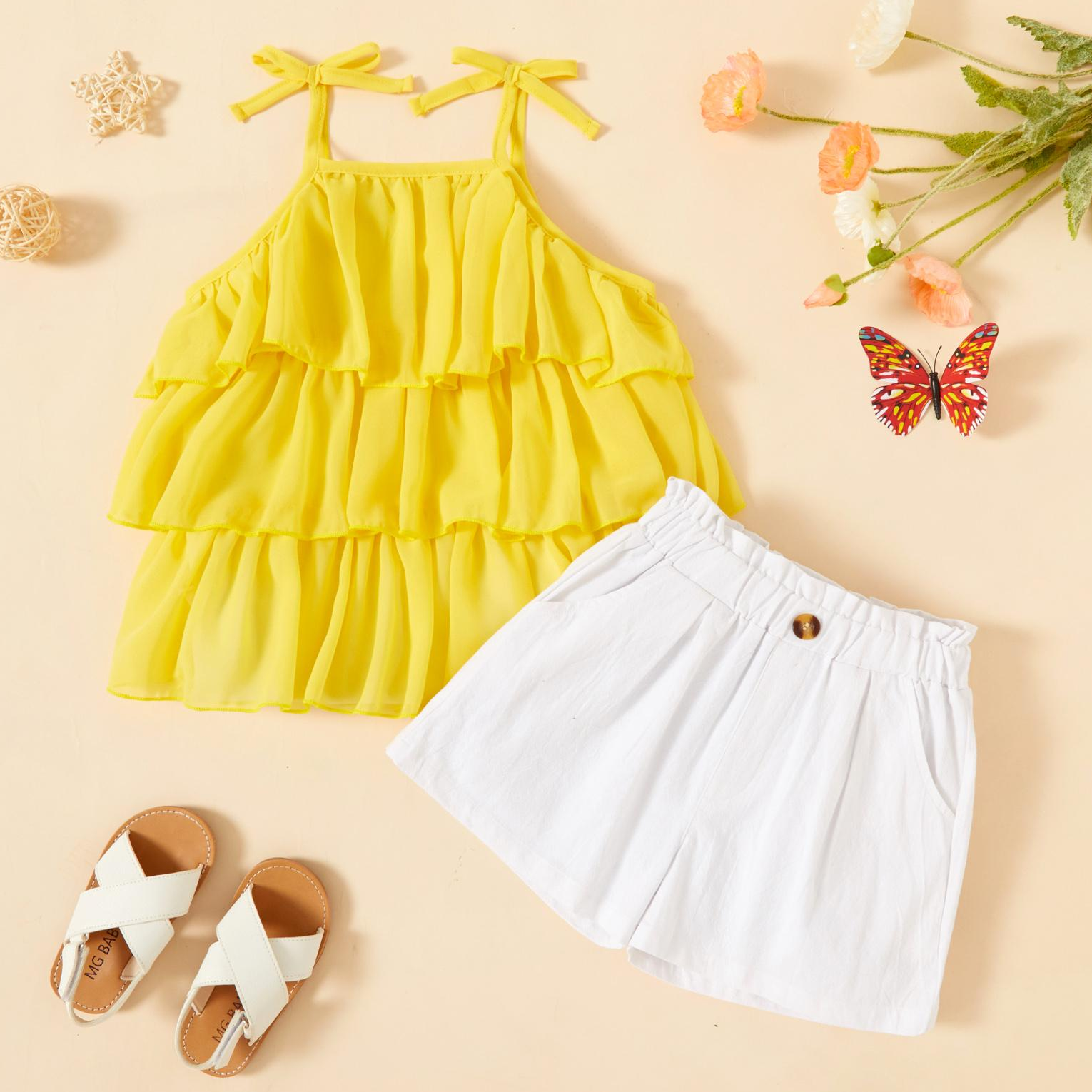 2-piece Toddler Ruffled Bowknot Solid Strap Top and Elasticized White Shorts with Pocket Sweet Set
2-piece Toddler Ruffled Bowknot Solid Strap Top and Elasticized White Shorts with Pocket Sweet Set