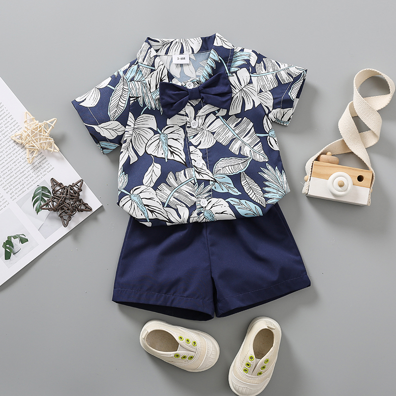 2pcs Baby Boy Bow Tie Decor Allover Palm Leaf Print Short-sleeve Shirt and Solid Shorts Set
2pcs Baby Boy Bow Tie Decor Allover Palm Leaf Print Short-sleeve Shirt and Solid Shorts Set