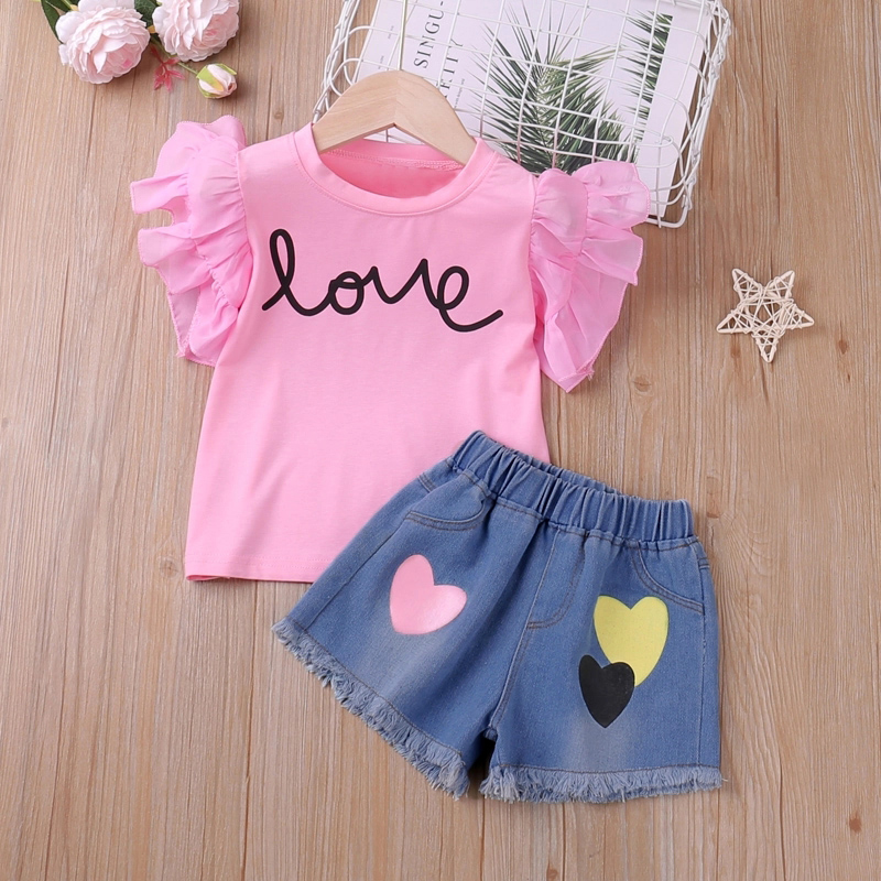 2pcs Toddler Girl Letter Print Mesh Flutter-sleeve Pink Tee and Heart Print Denim Shorts Set
2pcs Toddler Girl Letter Print Mesh Flutter-sleeve Pink Tee and Heart Print Denim Shorts Set