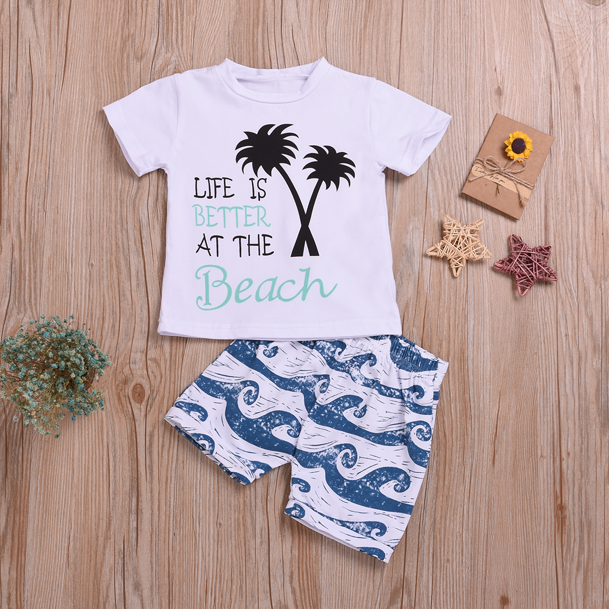 Baby / Toddler Boy Coconut Tree Print Tee and Sea Wave Print Beach Shorts Set
Baby / Toddler Boy Coconut Tree Print Tee and Sea Wave Print Beach Shorts Set