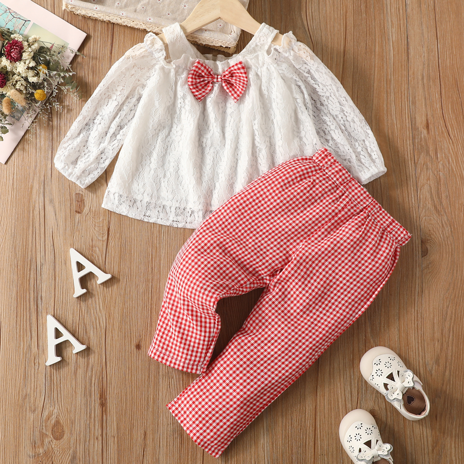 2pcs Toddler Girl Sweet Bowknot Design Cold Shoulder Lace Blouse and Red Plaid Pants Set
2pcs Toddler Girl Sweet Bowknot Design Cold Shoulder Lace Blouse and Red Plaid Pants Set