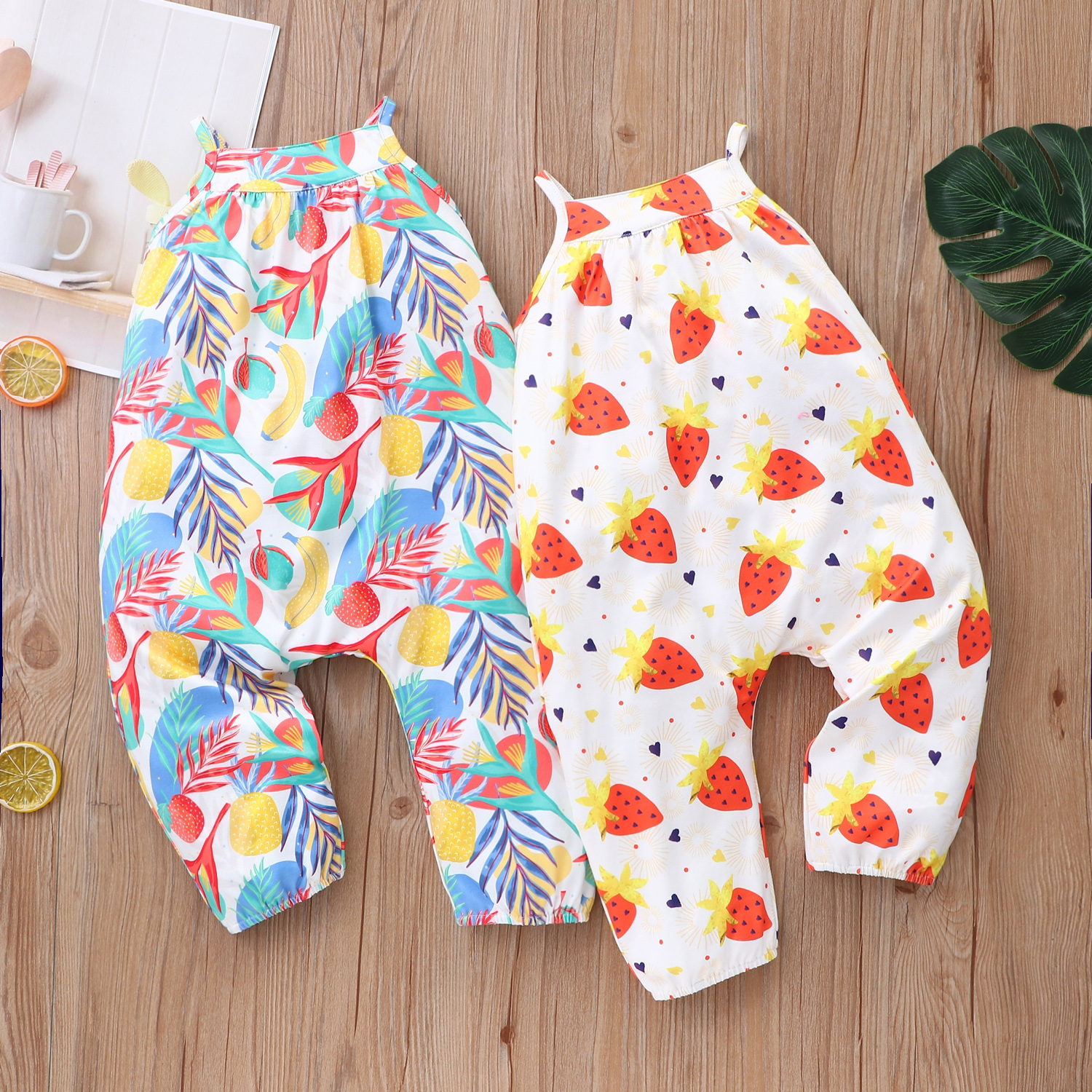 

Fruit Print White Baby Sling Jumpsuit
