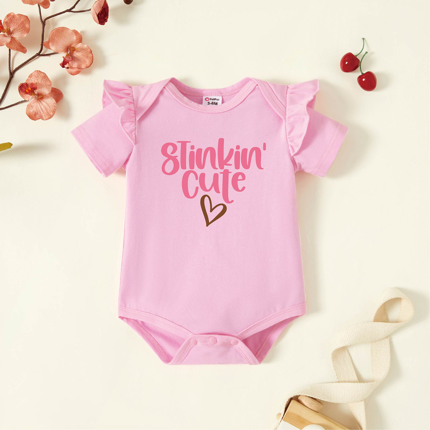 

Baby Girl Graphic Heart and Letter Print Ruffled Short-sleeve Romper