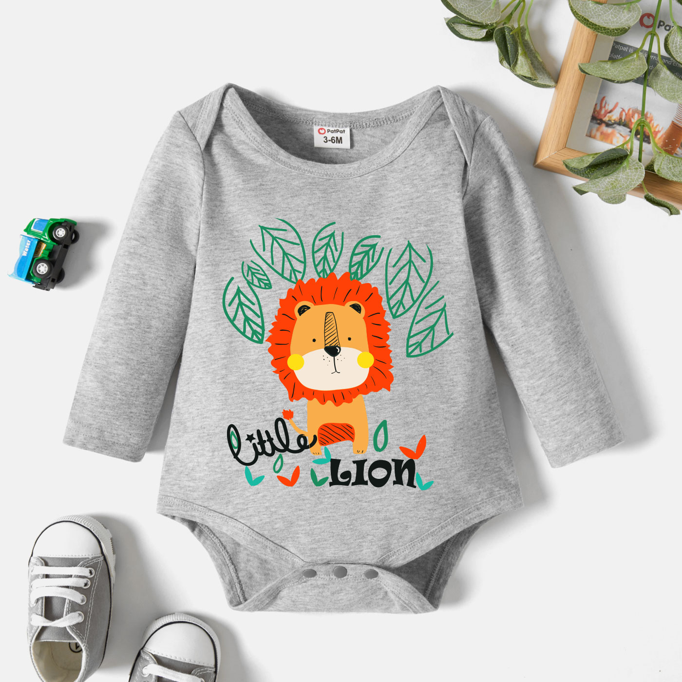 

Baby Graphic Lion and Leaf and Letter Print Long-sleeve Romper