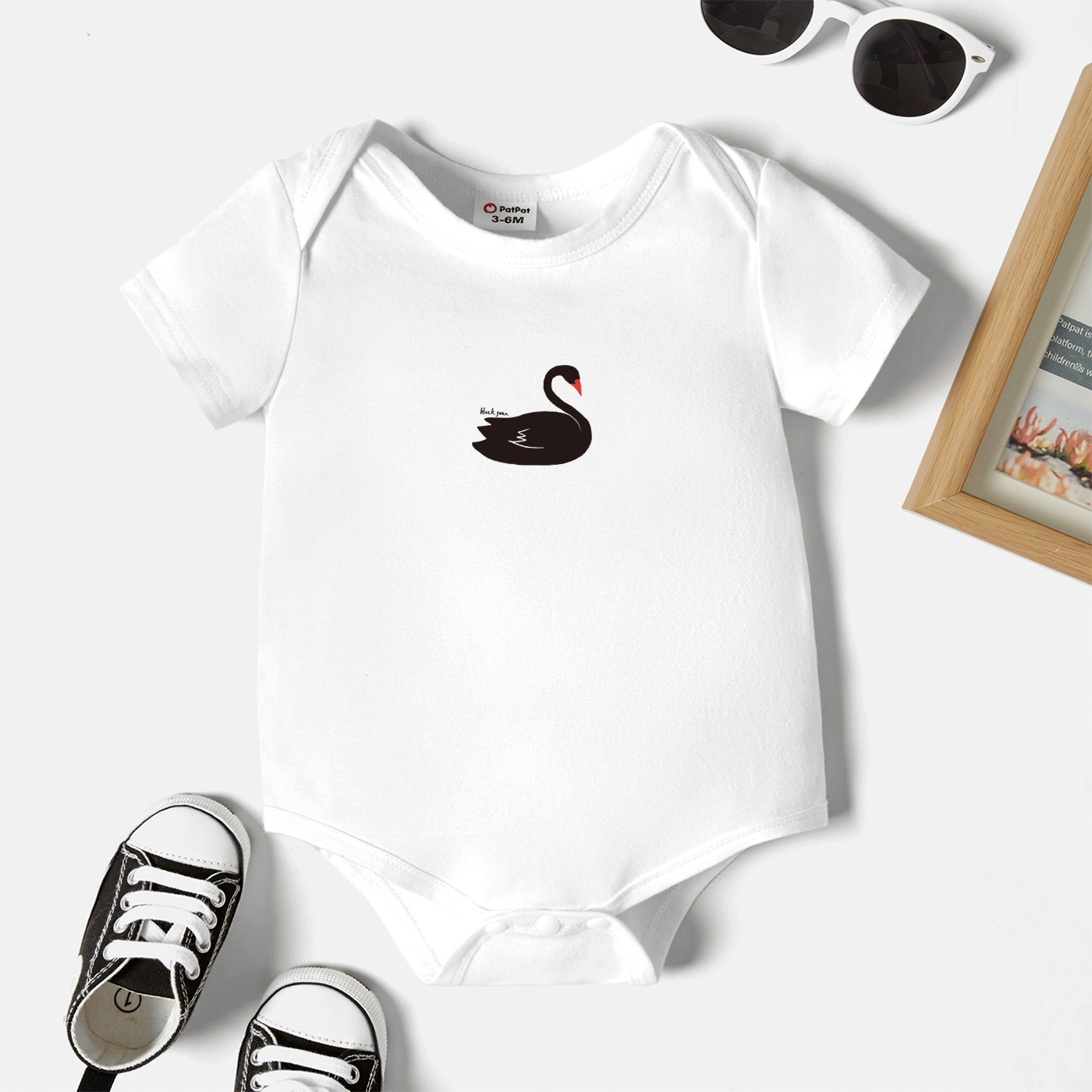 

Baby Graphic White Short-sleeve Romper
