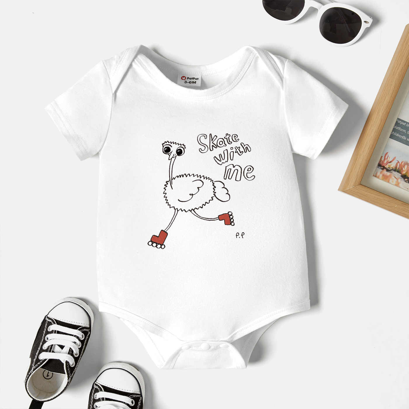 

Baby Graphic White Short-sleeve Romper