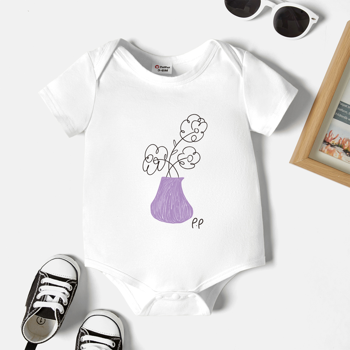 

Baby Graphic White Short-sleeve Romper