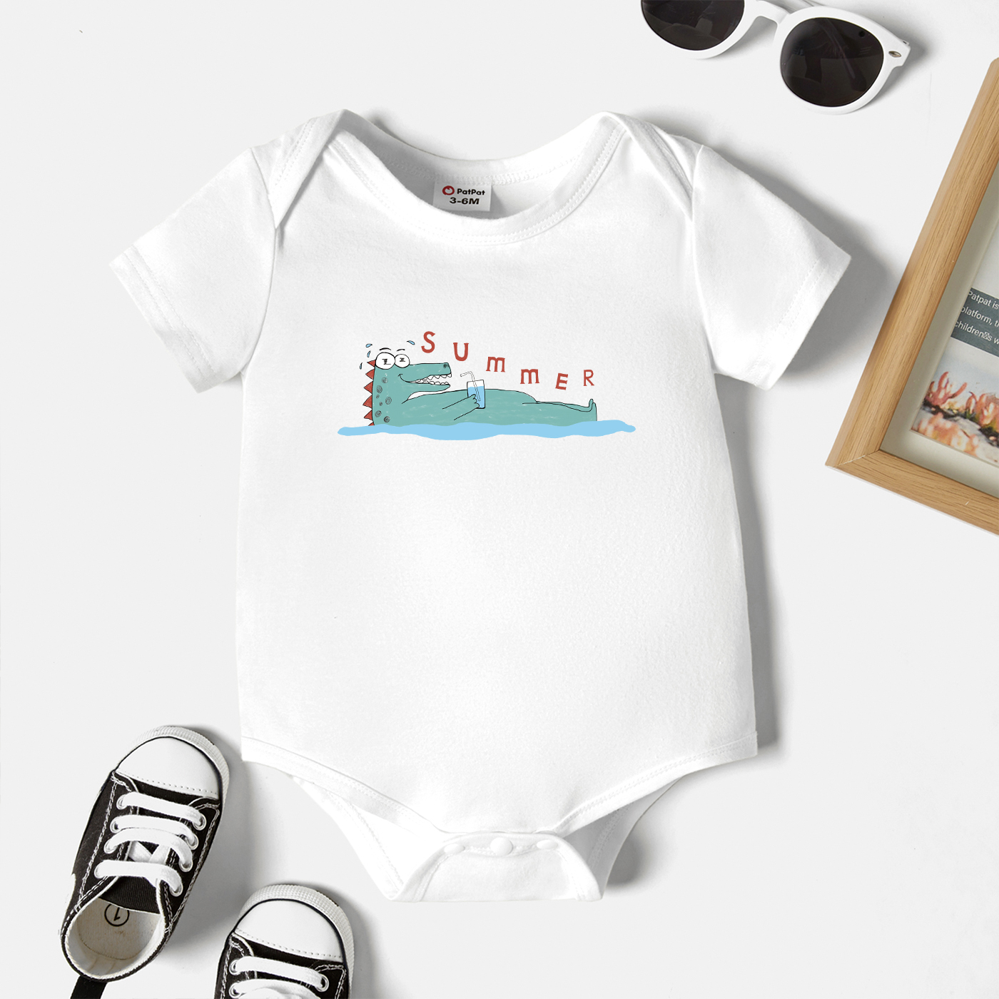 

Baby Graphic White Short-sleeve Romper