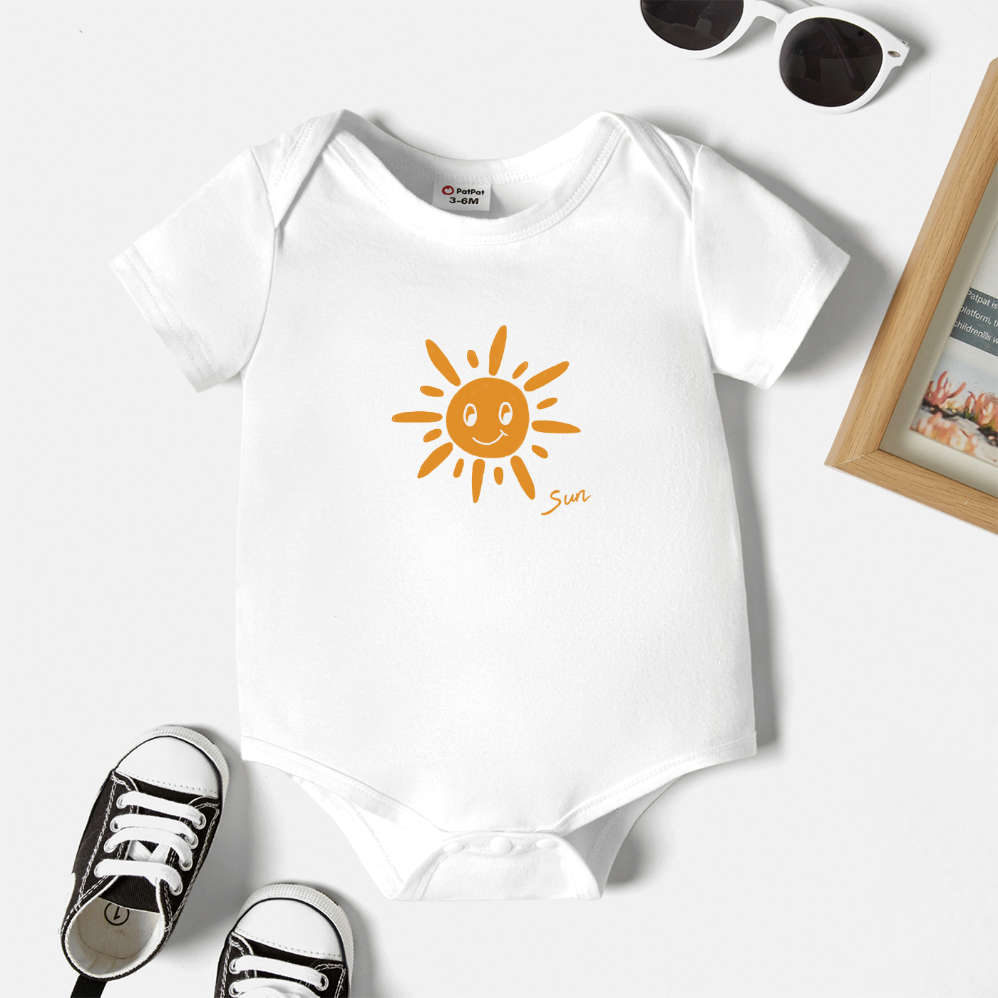 

Baby Graphic White Short-sleeve Romper