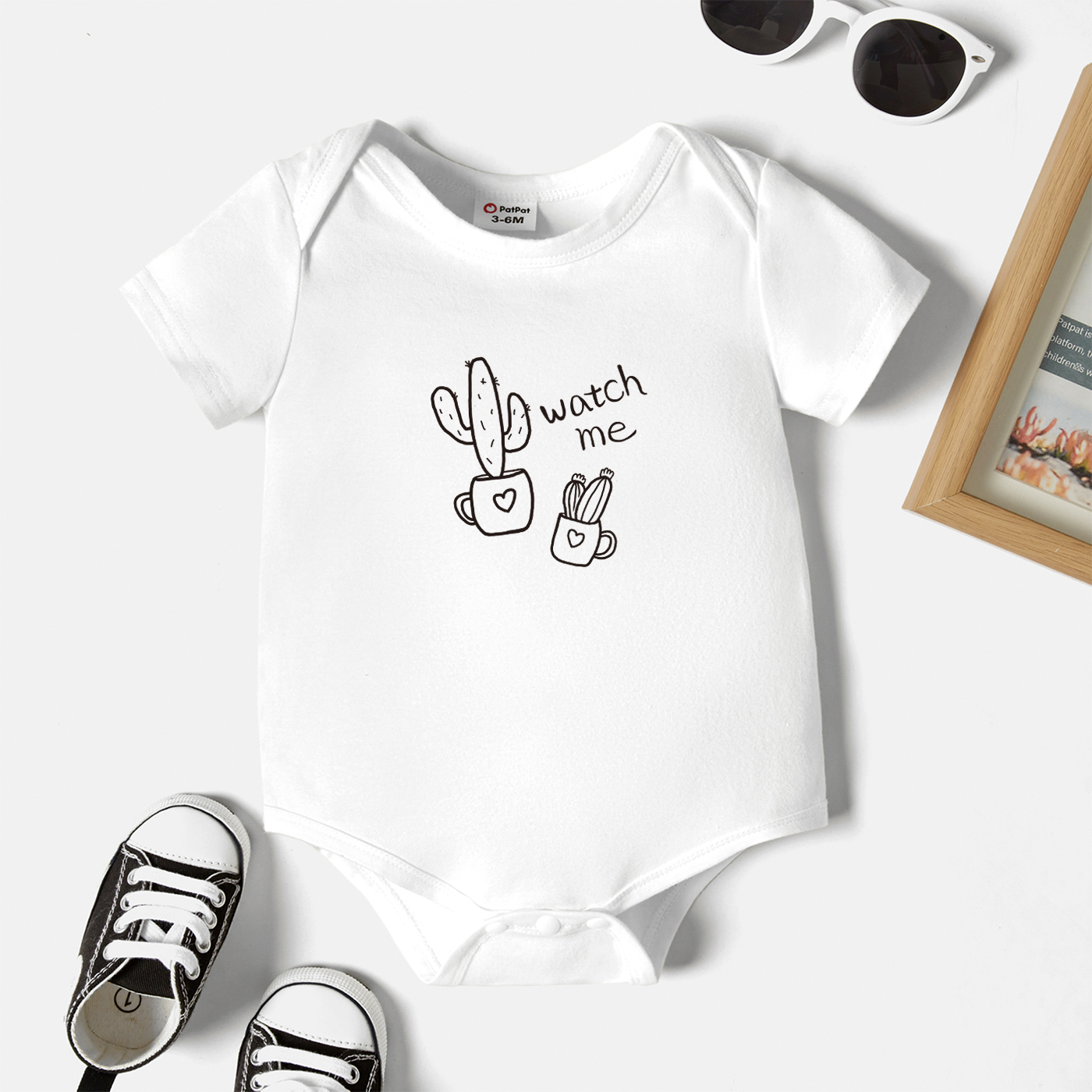 

Baby Graphic White Short-sleeve Romper