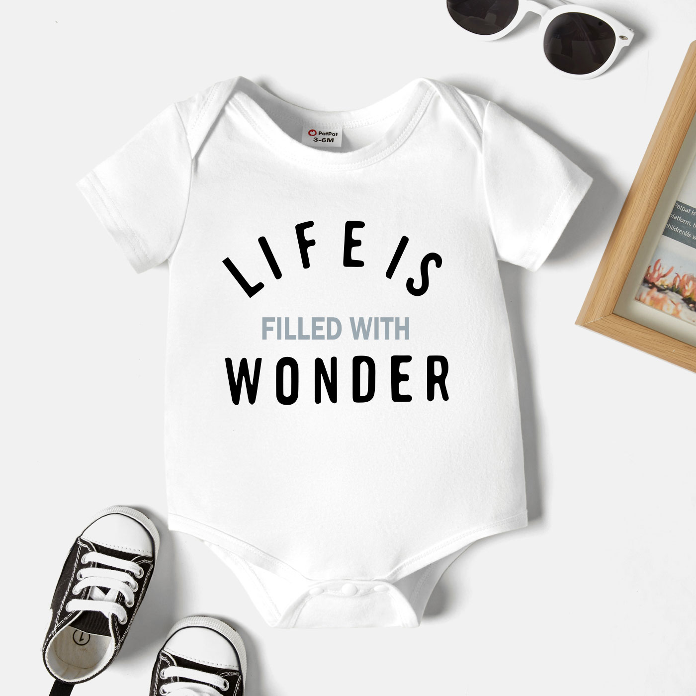 

Baby Graphic White Short-sleeve Romper