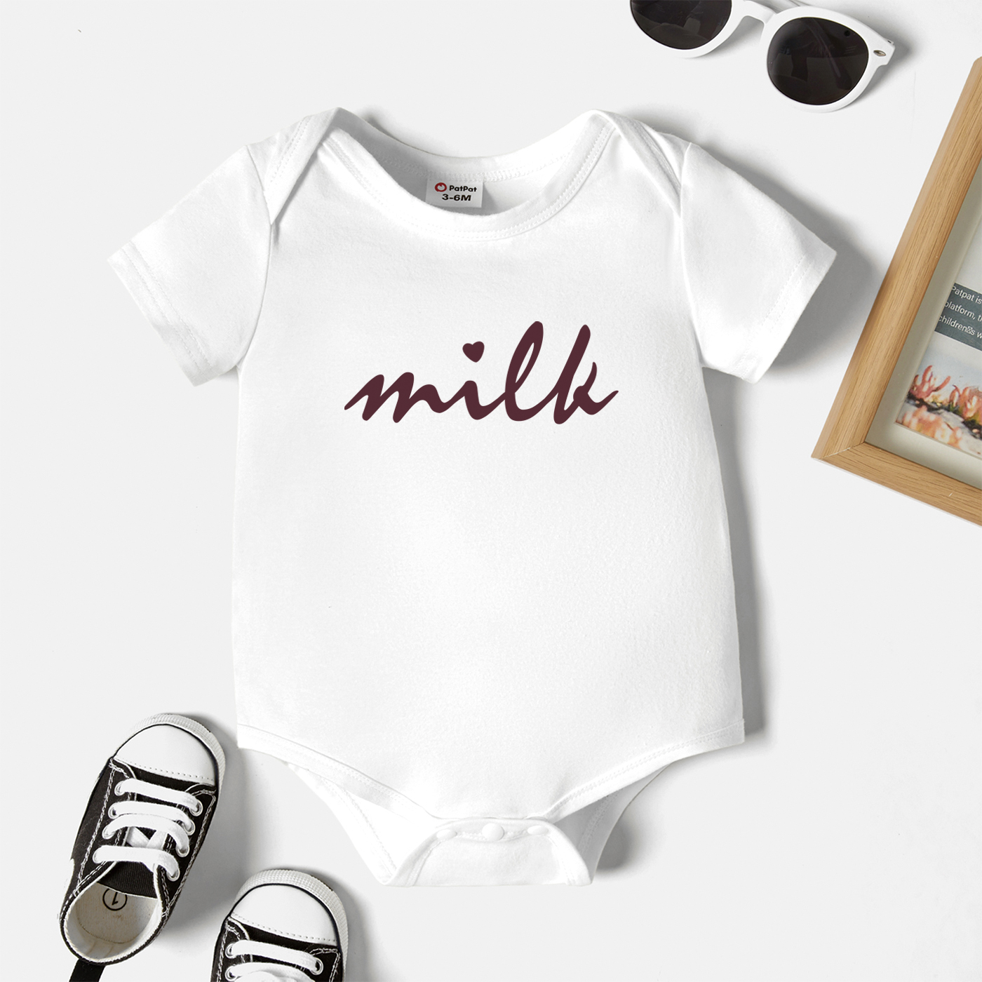 

Baby Graphic White Short-sleeve Romper