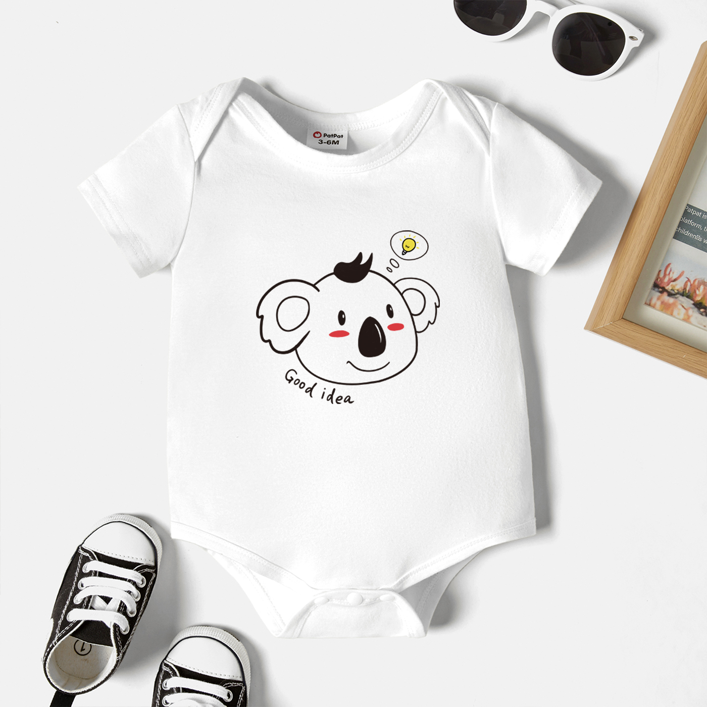 

Baby Graphic White Short-sleeve Romper