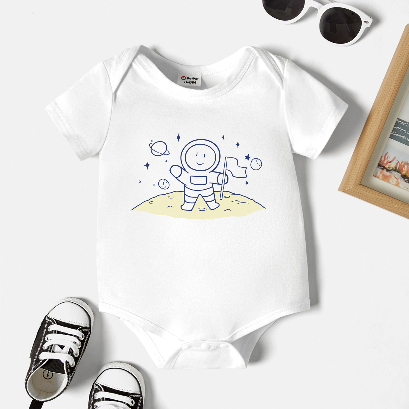 

Baby Graphic White Short-sleeve Romper