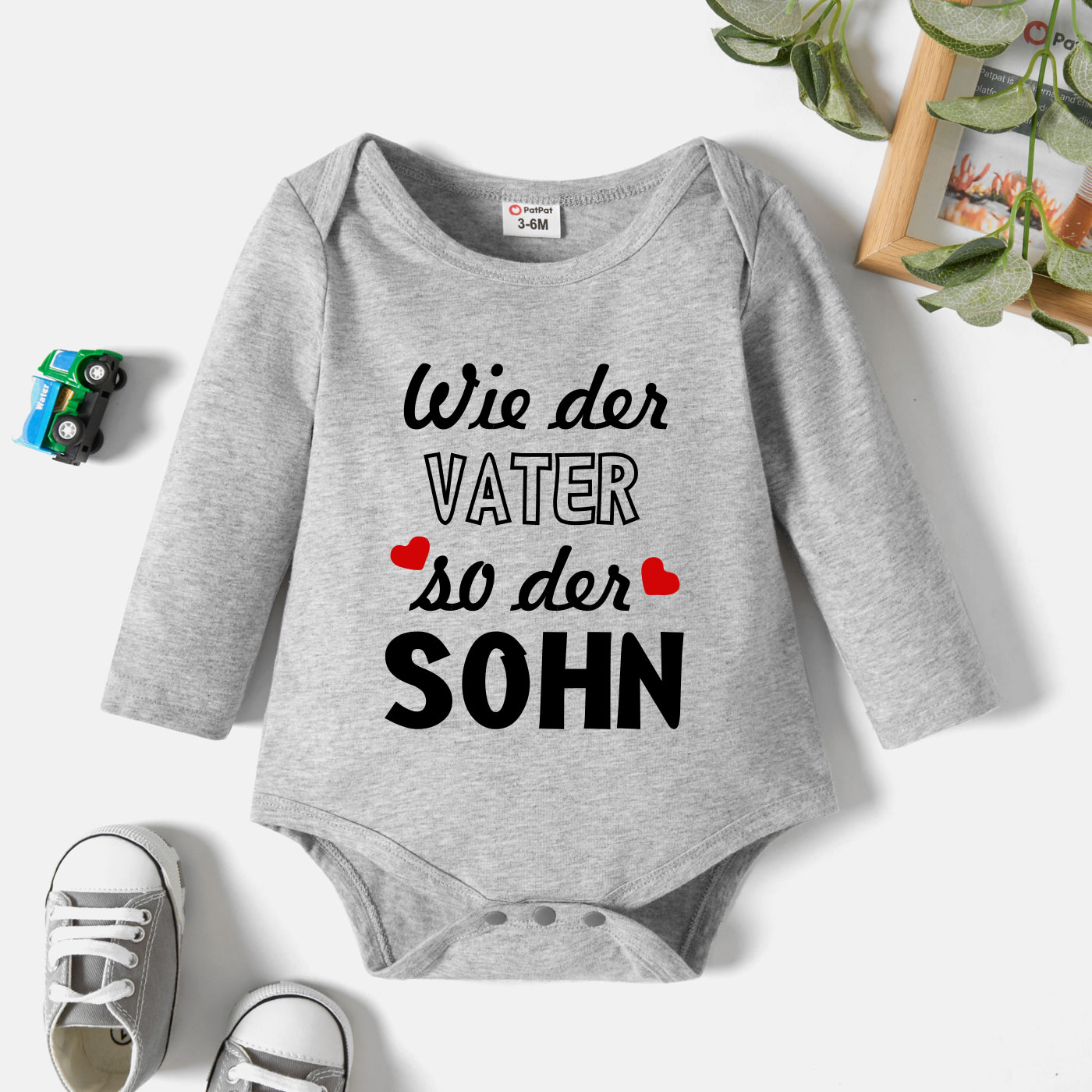 

Baby Graphic Heart and Letter Print Long-sleeve Romper