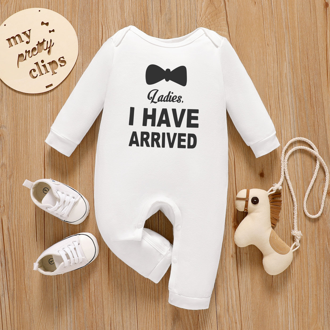 

Baby Graphic Letter and Bowknot Print Long-sleeve Jumpsuit