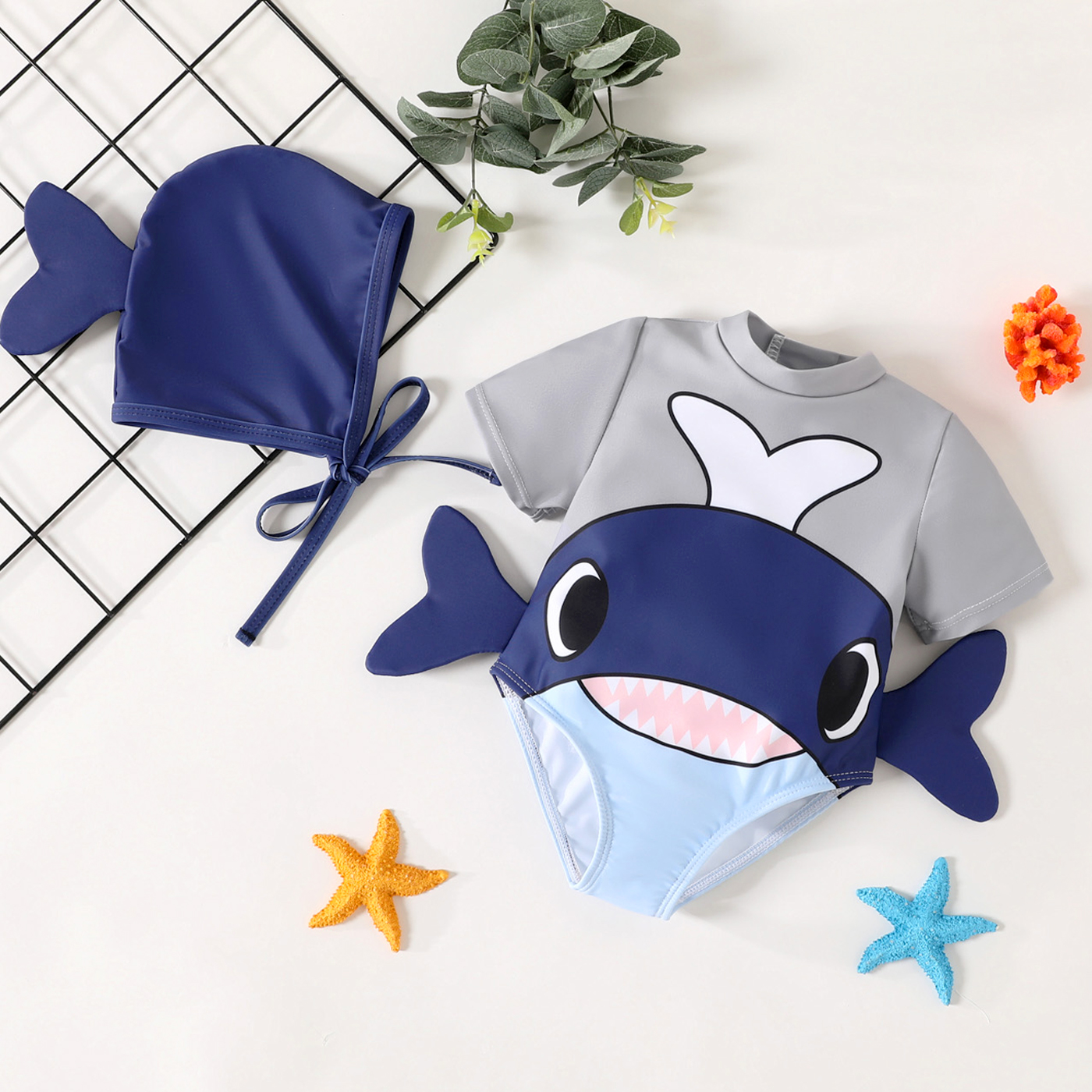 

2pcs Baby Boy Cartoon Shark Print Short-sleeve One-piece Swimsuit with Cap Set