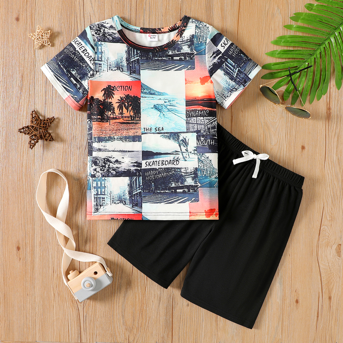 

2pcs Kid Boy Allover Print Short-sleeve Tee and Elasticized Black Shorts Set