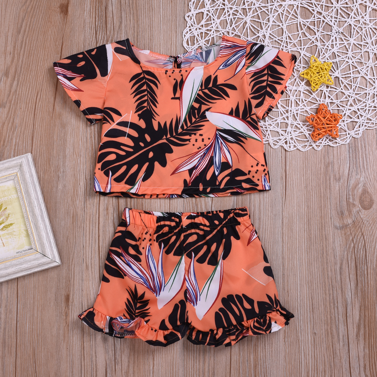 

Leaf Print Top and Ruffled Shorts Set