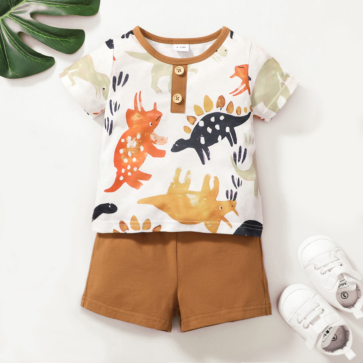 

2pcs Baby Boy 100% Cotton Shorts and Button Design All Over Dinosaur Print Short-sleeve T-shirt Set