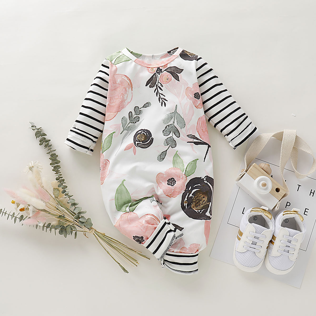 

Floral and Stripe Allover Long-sleeve Baby Jumpsuit