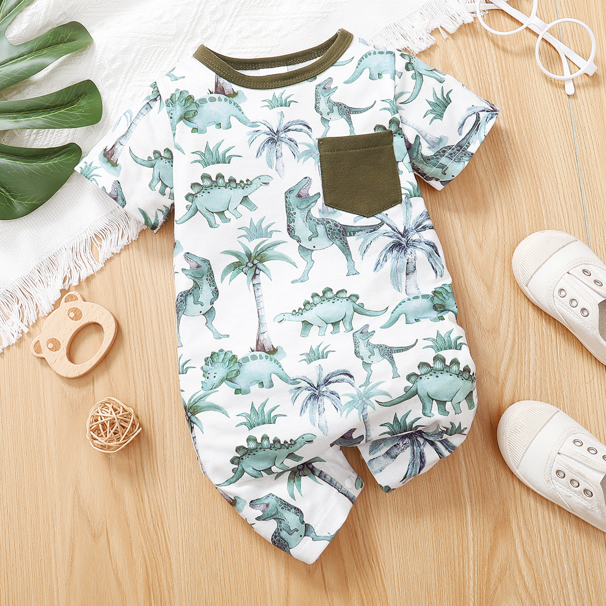 

Baby Boy All Over Dinosaur Print Short-sleeve Romper with Pocket