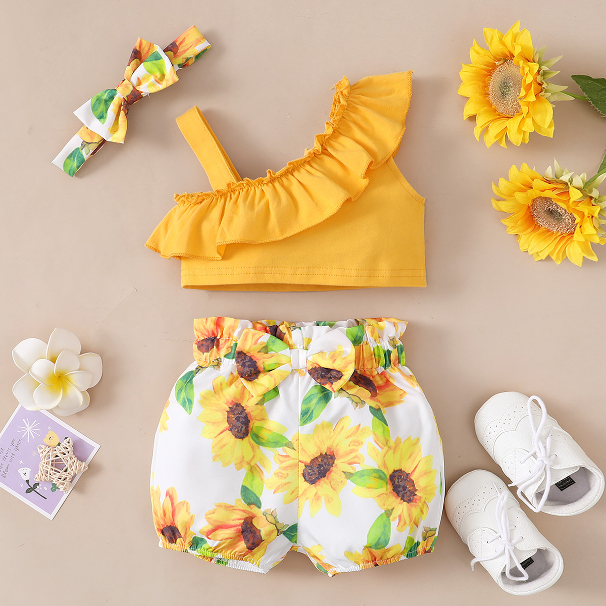 

3pcs Baby Girl Solid Sleeveless Ruffle Crop Tank Top and Sunflower Floral Print Bowknot Shorts with Headband Set