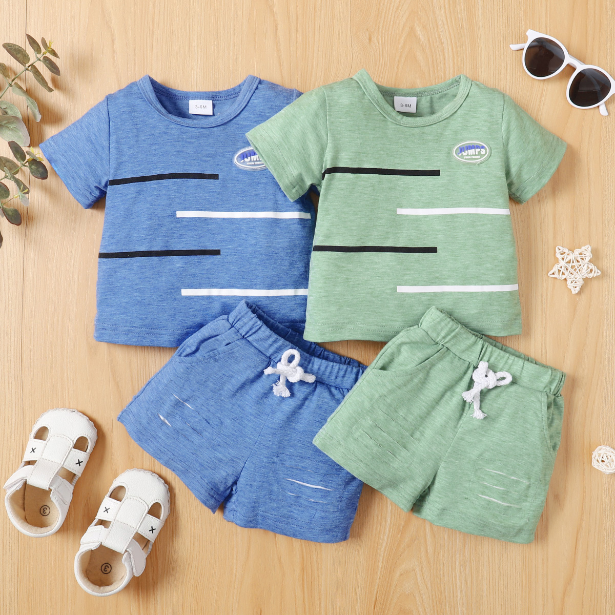 

2pcs Baby Boy Letter Patch Design Short-sleeve T-shirt and Ripped Shorts Set