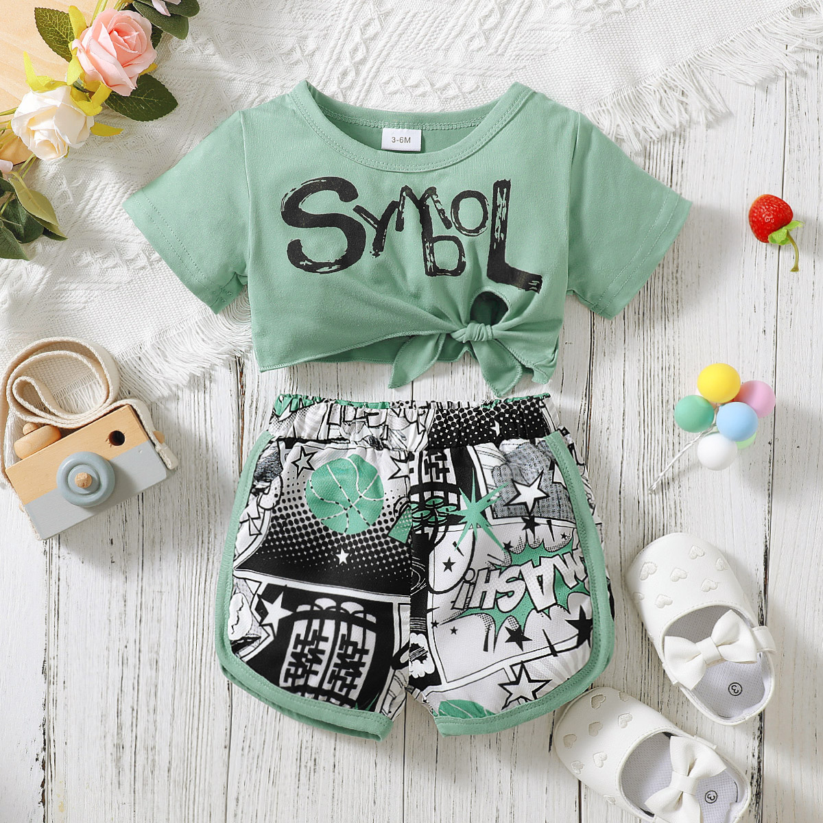 

2pcs Baby Girl Letter Print Short-sleeve Self-tie Crop Top and Comics Shorts Set