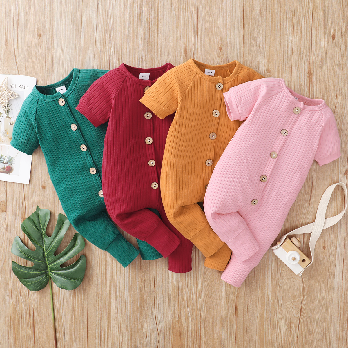 

Baby Boy/Girl Solid Ribbed Button Down Short-sleeve Jumpsuit
