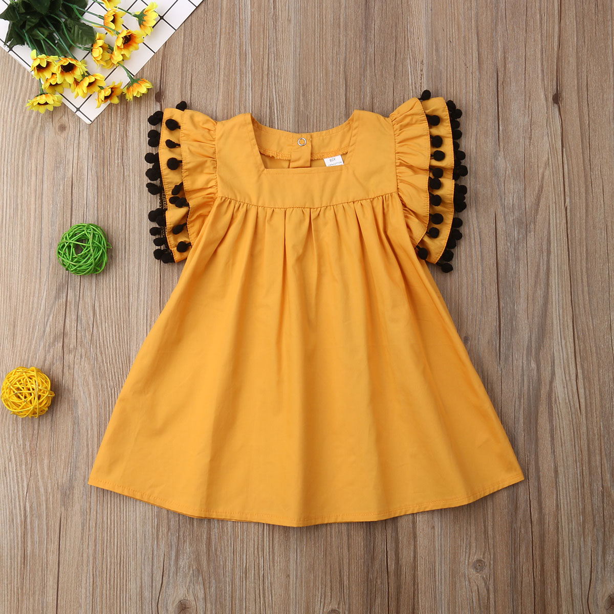 

Baby Pompon Decor Flutter-sleeve Dress
