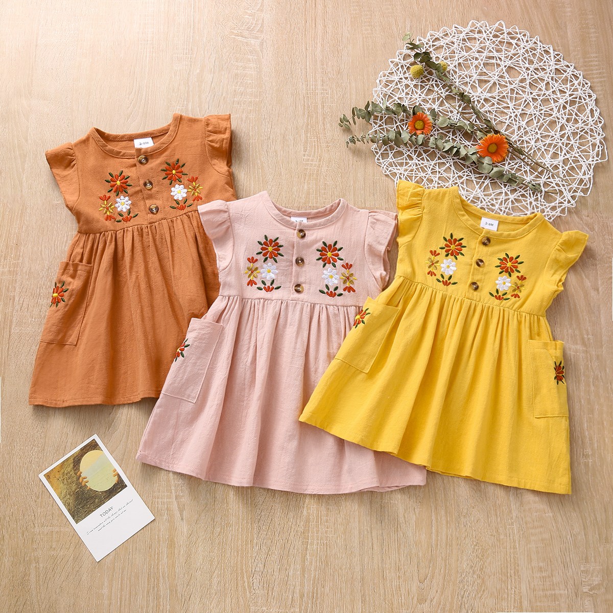 

Floral Embroidered Flutter-sleeve Baby Dress