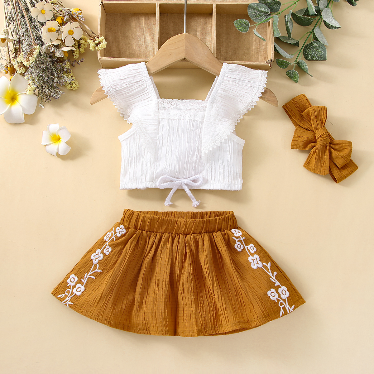 

3pcs Baby Girl Solid Textured Sleeveless Ruffle Top and Embroidered Skirt with Headband Set