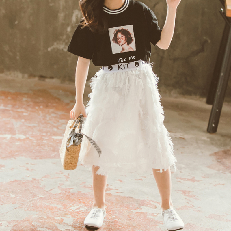 

Fashionable Short-sleeve T-shirt and Tasseled Skirt Set