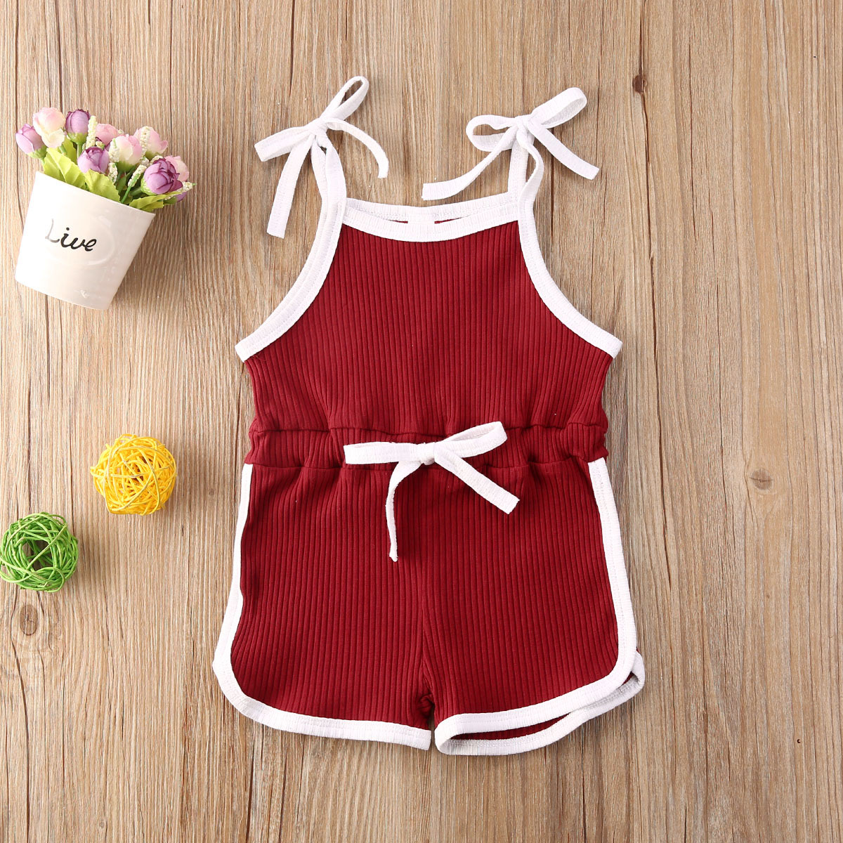 

Ribbed Solid Sleeveless Baby Romper