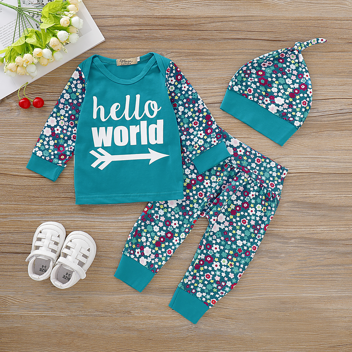 

3-piece Baby HELLO WORLD Print Tee and Floral Pants with Hat Set