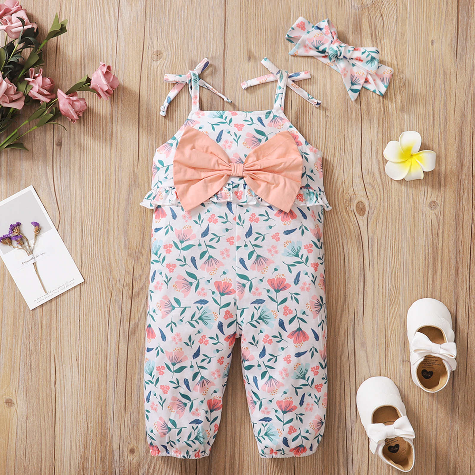 

2pcs Floral Print Ruffle and Bow Decor Sleeveless Pink Baby Set