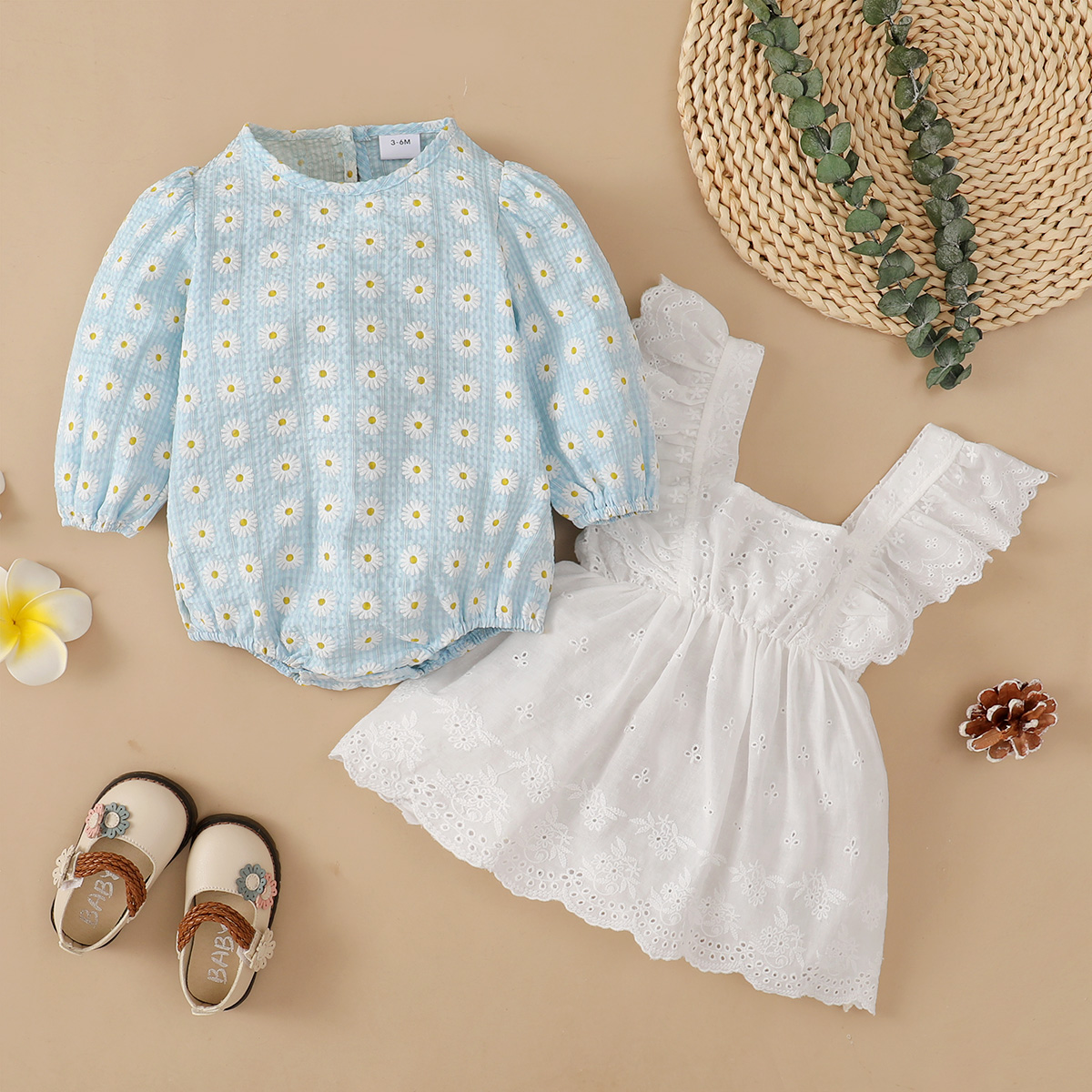 

2pcs Baby Daisy Floral Print Long-sleeve Romper and Hollow Out Ruffle Dress Set