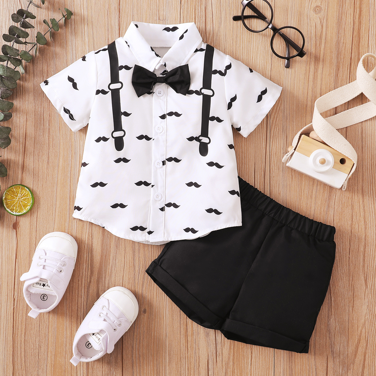 

2pcs Baby Boy Bow Tie Decor All Over Mustache Print Short-sleeve Shirt and Solid Shorts Set