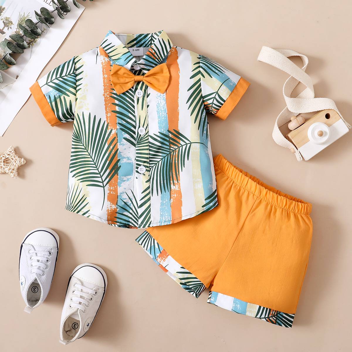 

2pcs Baby Boy Tropical Plant Print Short-sleeve Bow Tie Shirt and Shorts Set