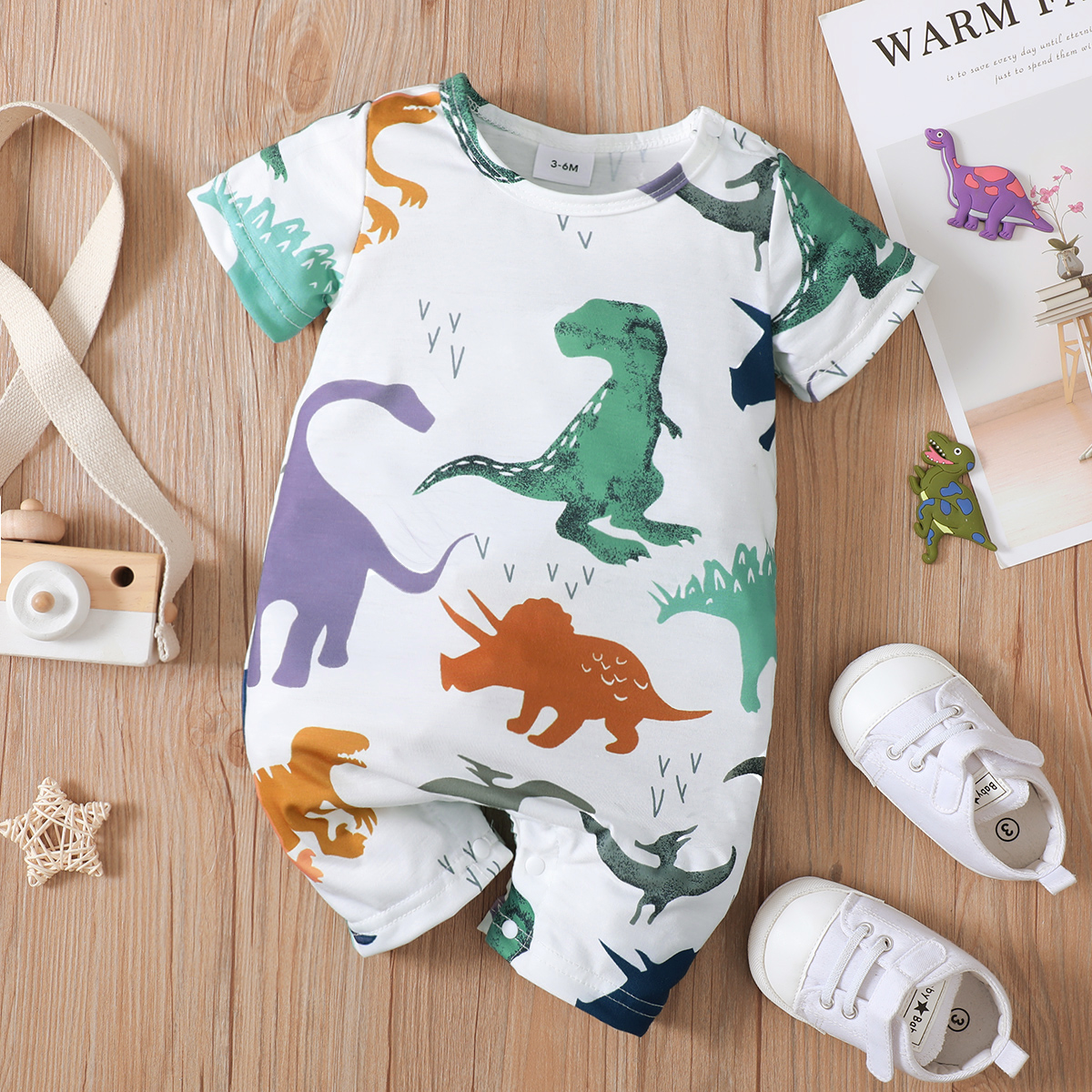 

Baby Boy Allover Dinosaur Print Short-sleeve Romper
