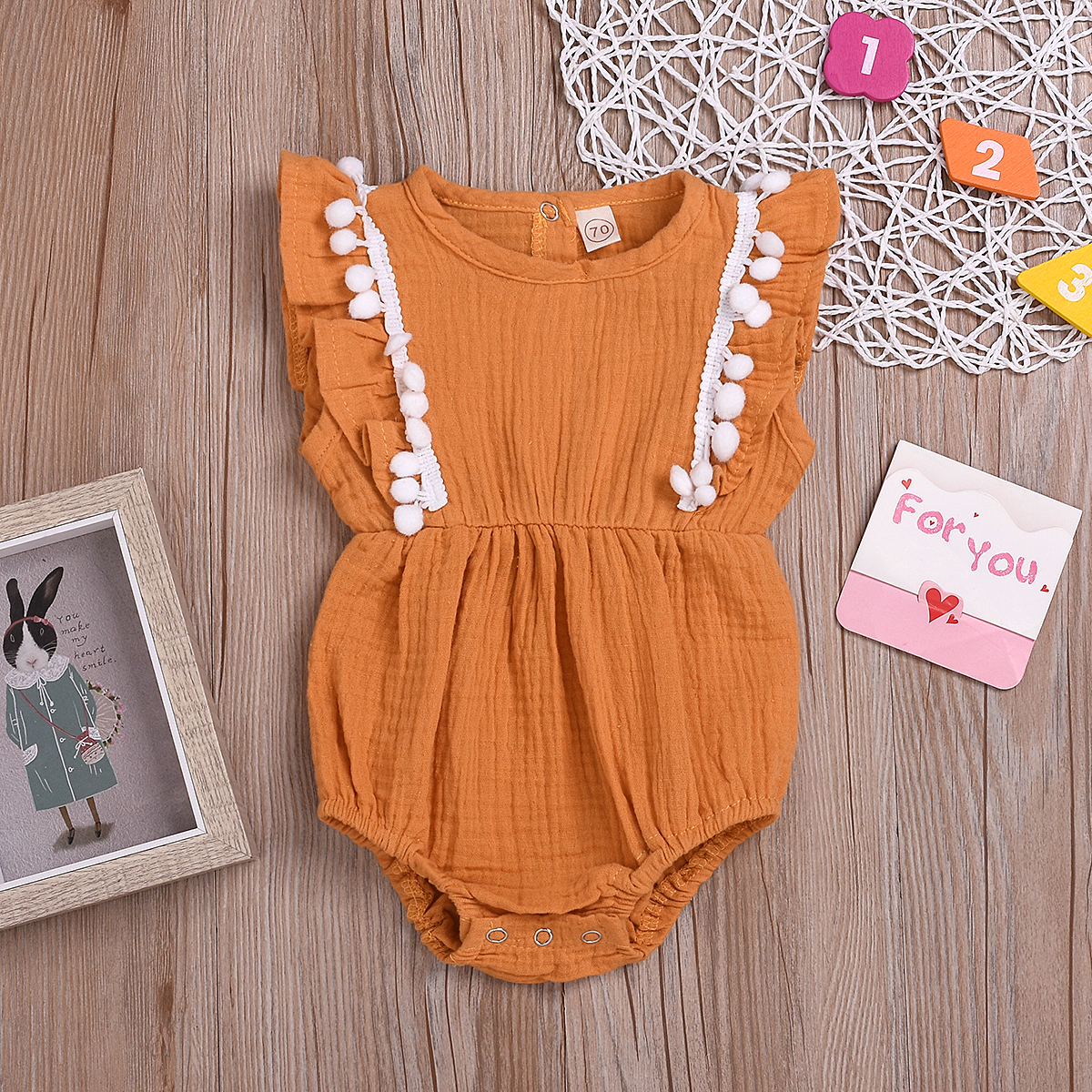 

Baby Ruffled Pompon Decor Solid Bodysuit