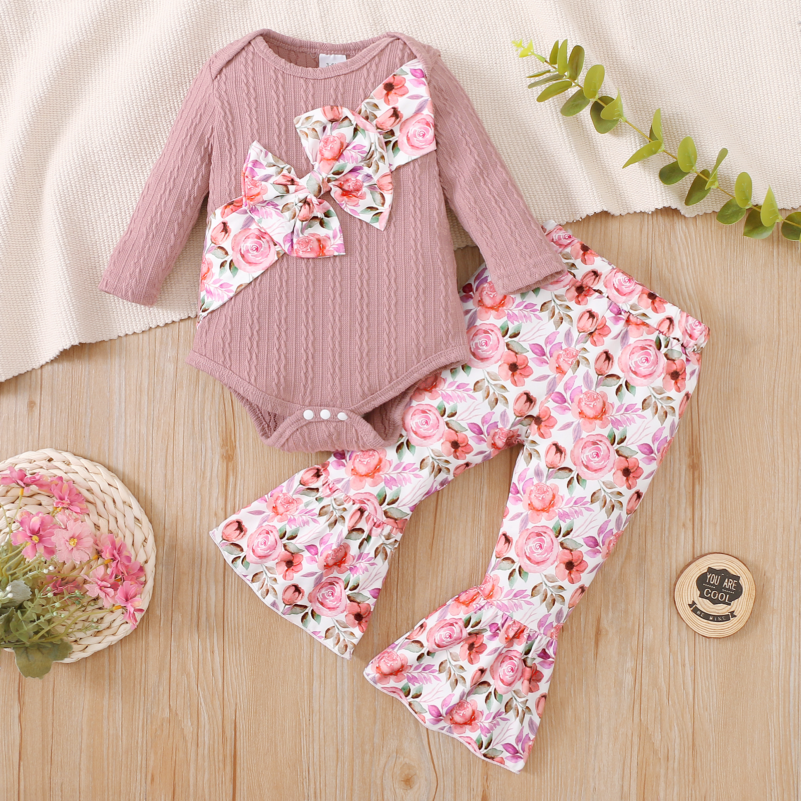 

2pcs Baby Girl Pink Cable Knit Long-sleeve Bowknot Romper and Floral Print Bell Bottom Pants Set