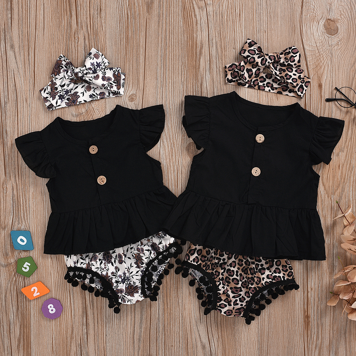 

Baby Casual Solid Flare-sleeve Top and Floral Shorts Set