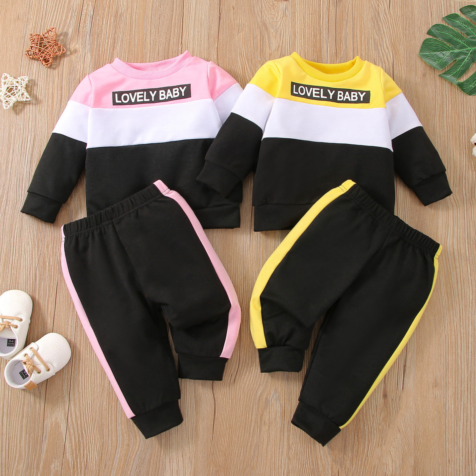 

2pcs Baby Girl Letter Print Color Block Long-sleeve Sweatshirt and Trousers Set