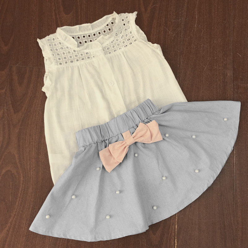 

Pretty Hollow Out Flounced Shirt and Pearl Decor Skirt Set