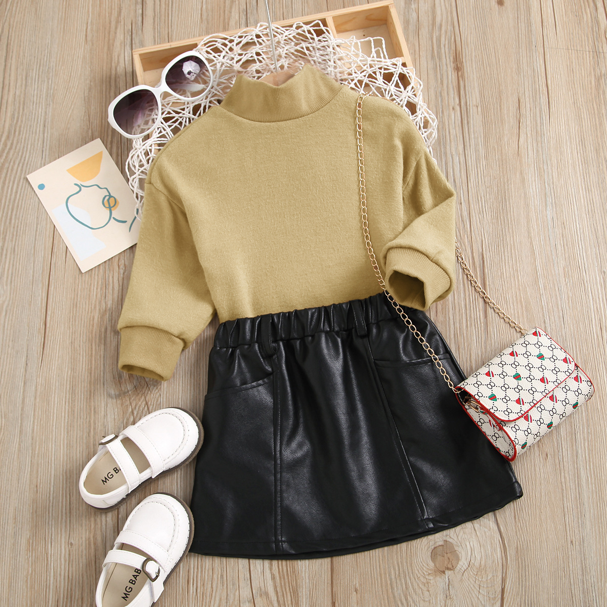 

2pcs Toddler Girl Trendy Turtleneck Sweater and Faux Leather PU Skirt Set