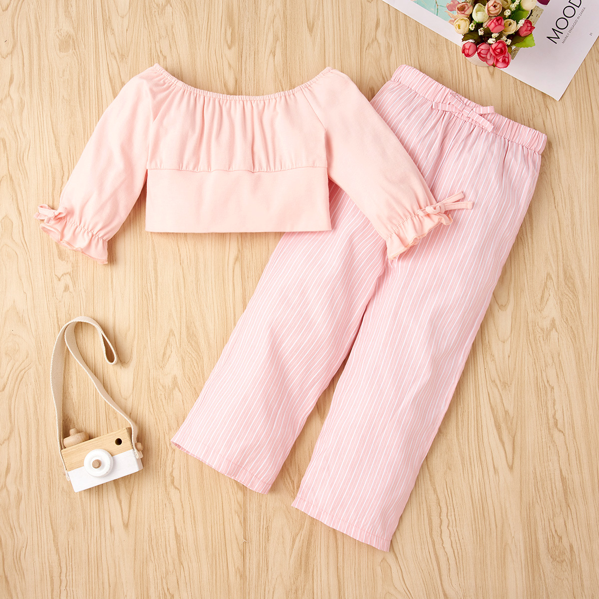 

2-piece Baby / Toddler Girl Bowknot Off Shoulder Solid Top and Striped Pants Set