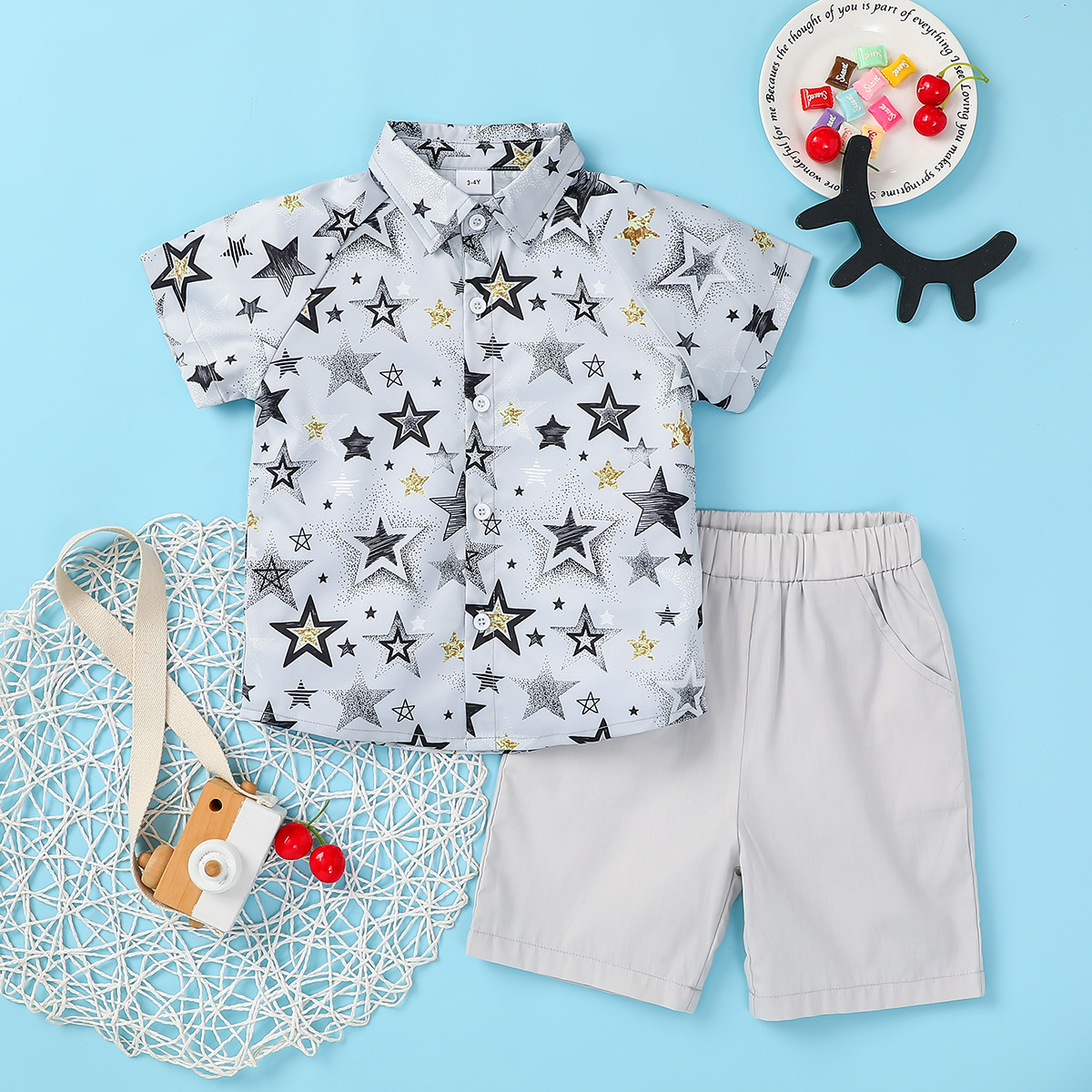 

2-piece Baby / Toddler Boy Stars Shirt and Solid Shorts Set