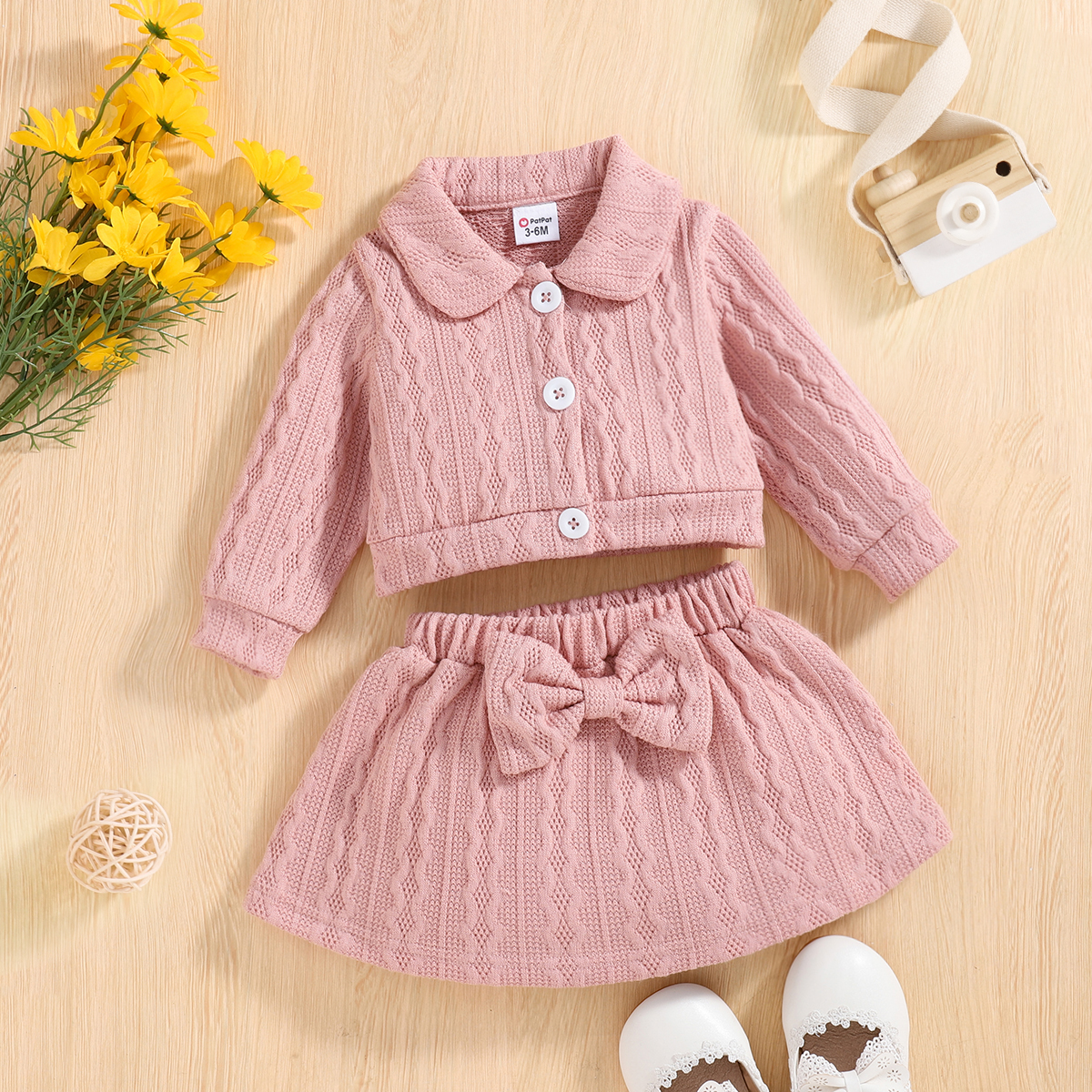 

2pcs Baby Girl Long-sleeve Button Front Pink Cable Knit Top and Bow Front Skirt Set